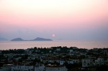 Luxury villas in Greece - Xenon Estate villas panoramic view during sunrise to the traditional village of the greek island of Spetses as well as of Hydra